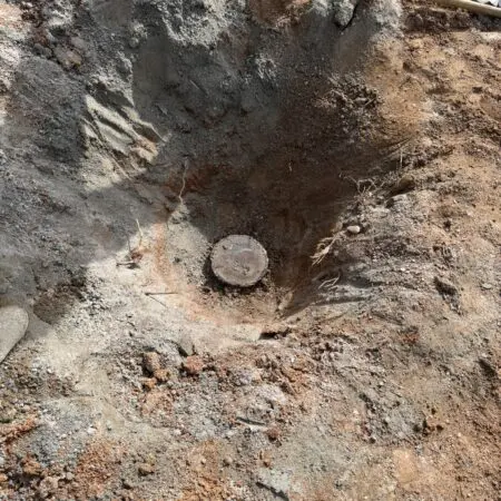 well drilling hole in dirt
